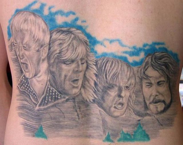 Series of the most WTF tattoos ;)  (60 photos)