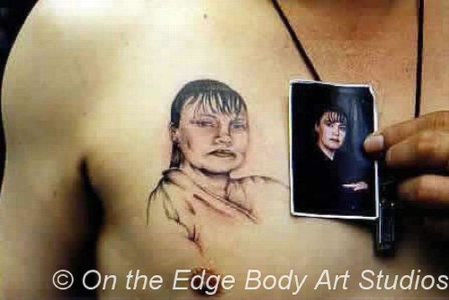 Series of the most WTF tattoos ;)  (60 photos)