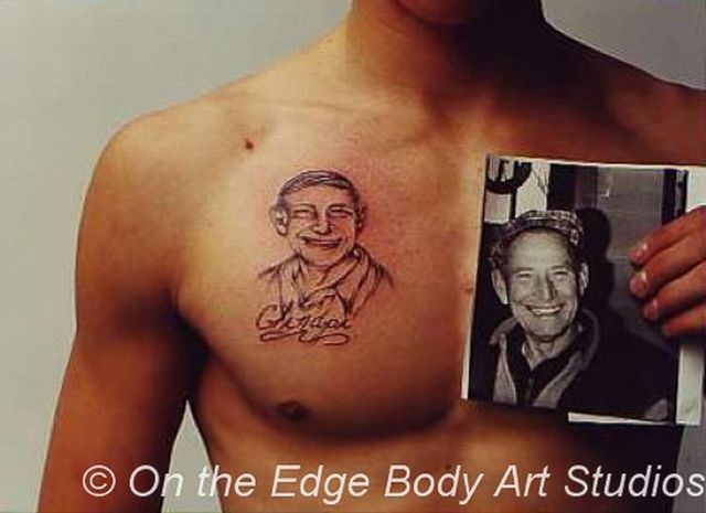 Series of the most WTF tattoos ;)  (60 photos)