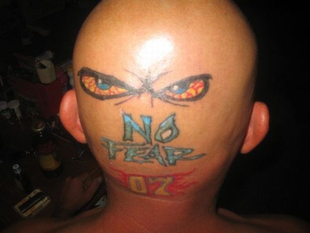 Series of the most WTF tattoos ;)  (60 photos)