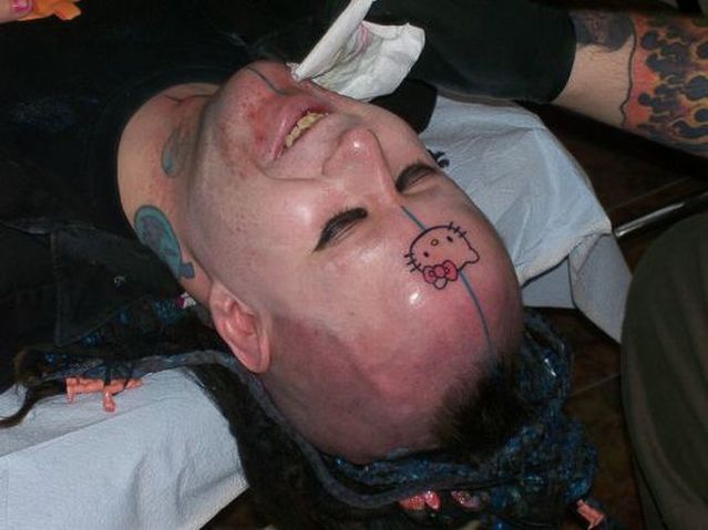 Series of the most WTF tattoos ;)  (60 photos)