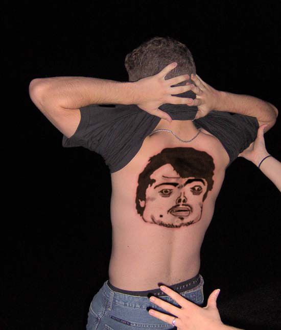 Series of the most WTF tattoos ;)  (60 photos)