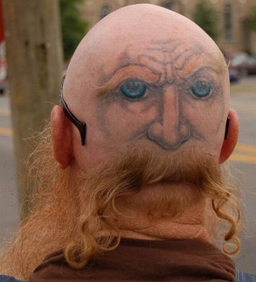 Series of the most WTF tattoos ;)  (60 photos)