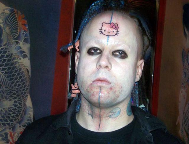 Series of the most WTF tattoos ;)  (60 photos)