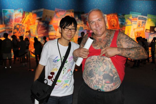 Man with Disneyland cartoons tattoos (15 pics)