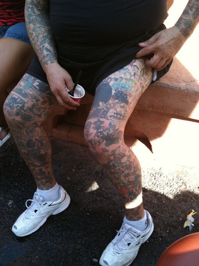 Man with Disneyland cartoons tattoos (15 pics)