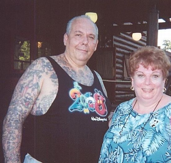 Man with Disneyland cartoons tattoos (15 pics)