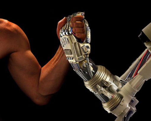 Man and Machine Working Hand in Hand Man and Machine Working Hand in Hand