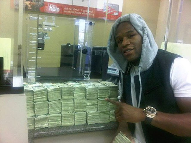 Floyd Mayweather Shows Off His $100 Million Paycheck to the World