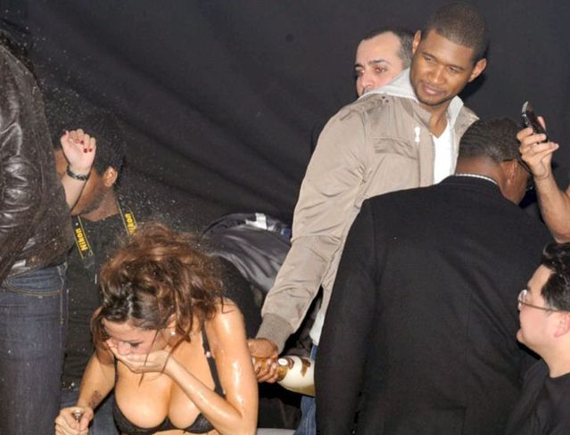 Usher at a party with strippers (6 photos)