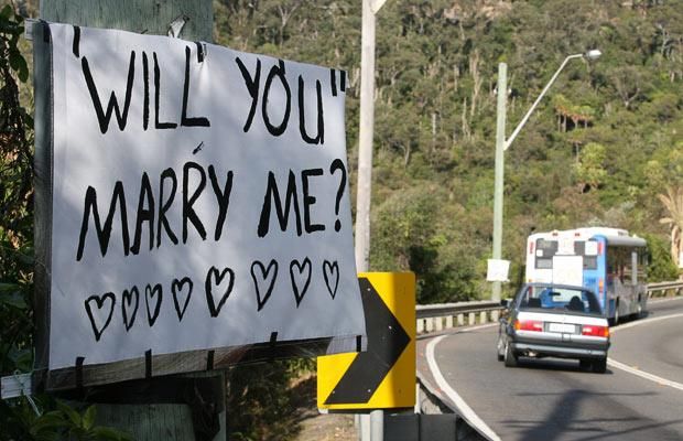 An unusual marriage proposal on telephone poles! (5 pics)