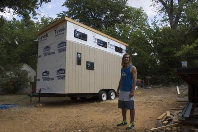 This Dude Has Found a Clever Way to Cut Down on His Living Costs