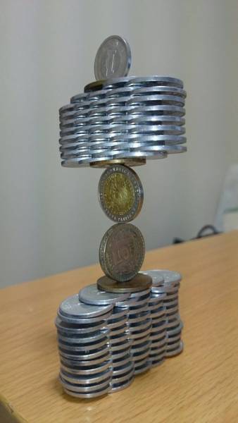 This Japanese Guy Took Coin Stacking To A Whole New Level